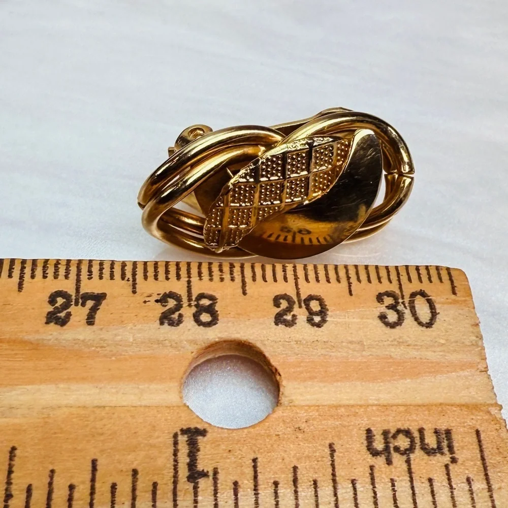 Vintage, aged goldtone, weighted clip on earrings